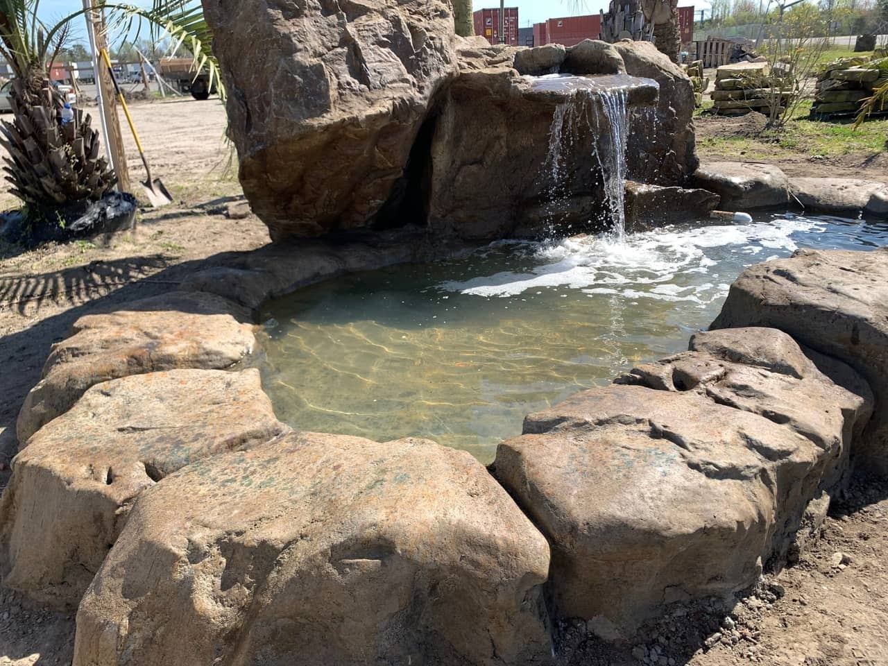 Completed hand-carved GFRC waterfall feature in Frisco, TX