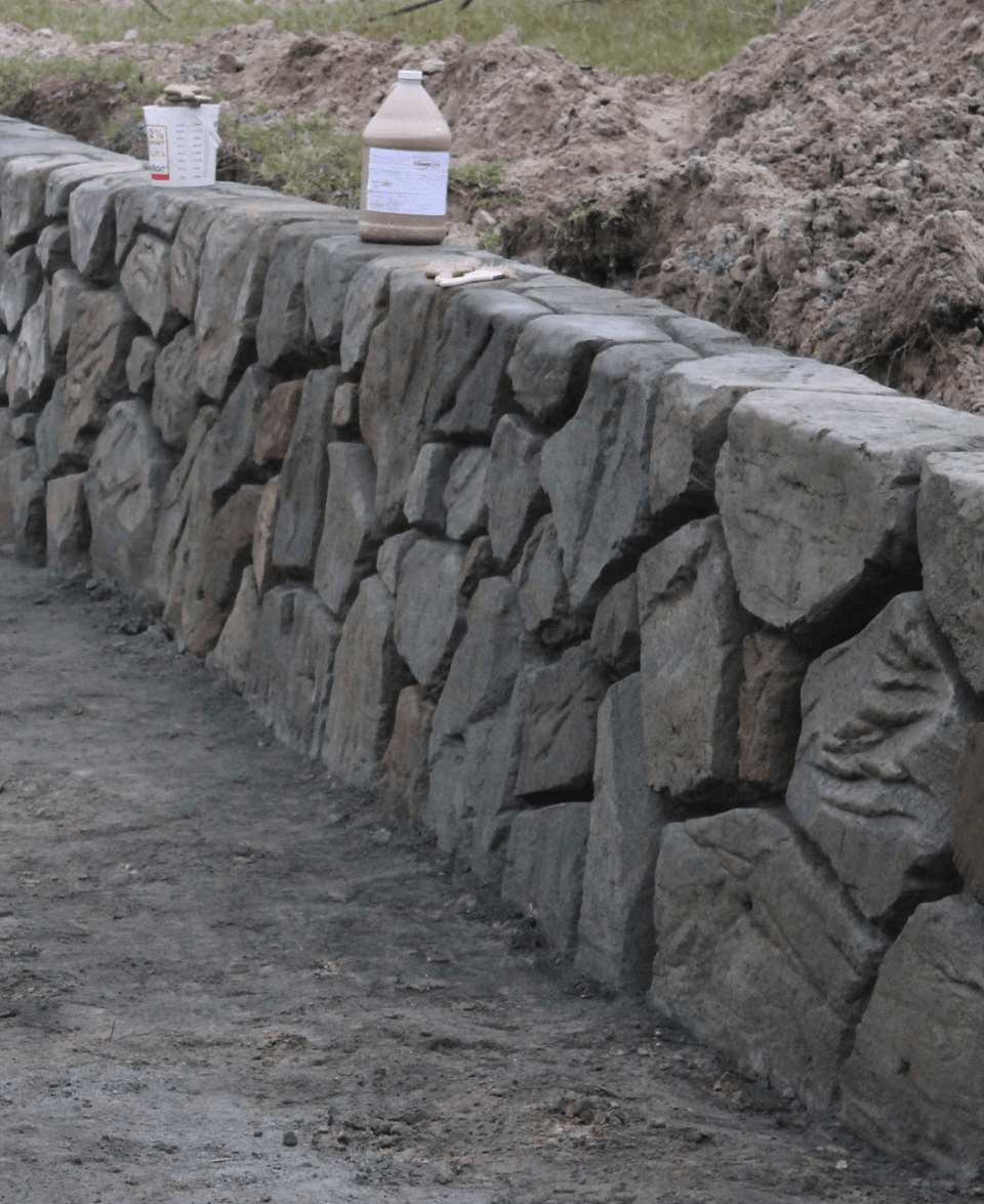 Multi-tier concrete retaining wall system on steep Fort Worth hillside