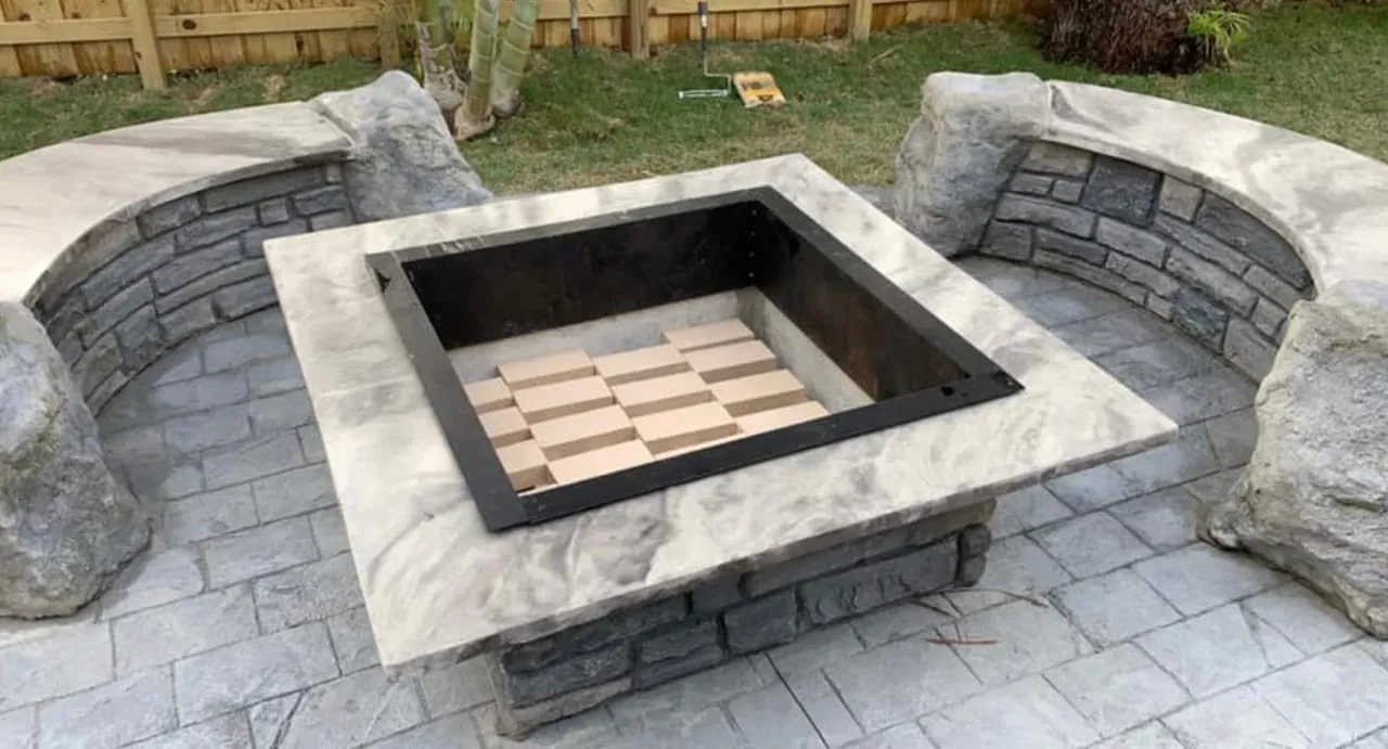 Custom GFRC fire pit with built-in seating wall in Dallas-Fort Worth