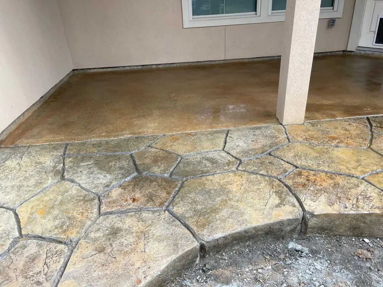 Curved hand-carved concrete patio extension for outdoor entertaining and dining